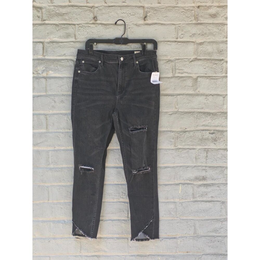 Free People Greyed Out Skinny Jeans Size 31 NWT Black Distressed Tulip Hem Denim